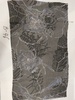 名称：黑地锦花纹印花烂花绡
尺寸：40cm*74cm
年代：60年代
描述：烂花绡是一种交织面料，织物具有绡地透明、花纹光泽明亮、质地轻薄爽挺的特点。

