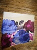 名称：1980-1990年代出口样品
 
类别：丝织品
尺寸：16*11.3（厘米） 
年代：公元二十世纪
描述：蓝棕色花卉图案纹样面料。

