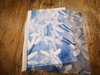 名称：1980-1990年代出口样品
 
类别：丝织品
尺寸：16*11.3（厘米） 
年代：公元二十世纪
描述：蓝色系花卉图案纹样面料。
