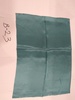 名称：墨绿色染色绉缎
尺寸：37cm*50cm
年代：60年代
描述：绉缎，一种丝织物，以经丝为平丝，强捻丝为纬丝，二左二右排列，采用缎纹组织交织。

