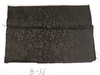 名称：黑色龙凤花卉锦
尺寸：38cm*53cm
年代：60年代
描述：丝织物的一种。在三色以上纬丝织成的缎纹地上织出的绚丽多彩、古雅精致的花纹织物。
